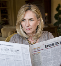 woman-reading-newspaper